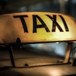 Photo of an old taxi sign on a Bangkok taxi.Thailand-Property.com