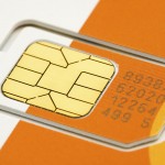 Photo of a bright orange mobile phone simcard