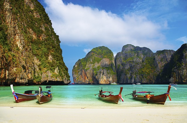 Tropical beach, traditional long tail boats, famous Maya Bay, Thailand.Thailand-Property.com