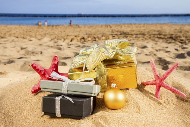 christmas gifts with stafish on beach with golden sand at sunny day. Thailand-Property.com