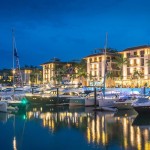 Royal Phuket Marina condos at night.