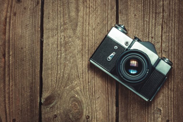 Vintage Camera On Wooden Background
